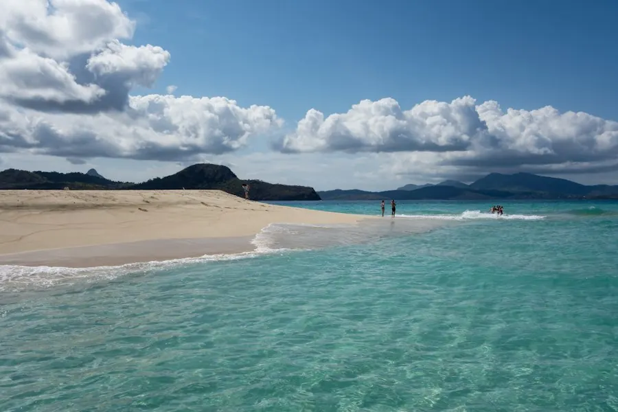 Beach with clear turquoise water and sandy shore
